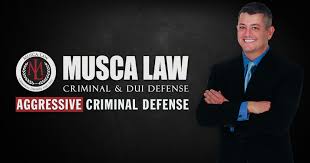 Musca Law logo